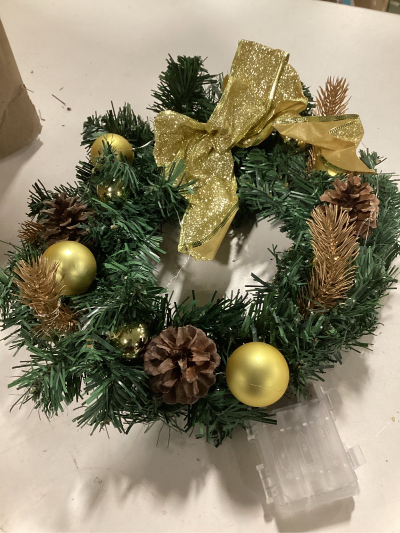 Condition photo showing As Is for ( similar products) 8 pack christmas wreath with light gold hanging garland