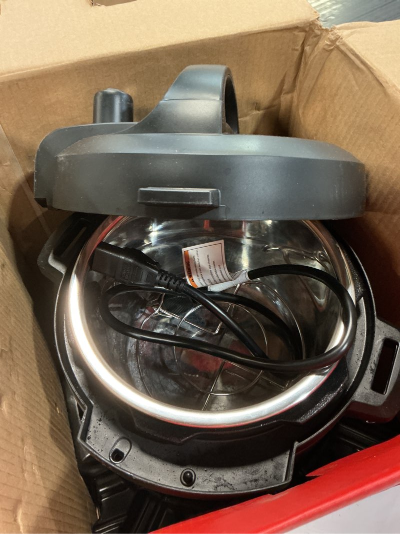 Condition photo showing As Is for instant pot duo 7-in-1 mini electric pressure cooker, slow rice cooker, steamer, sauté, yogurt maker, warmer & sterilizer, includes free app with over 1900 recipes, stainless steel, 3 quart