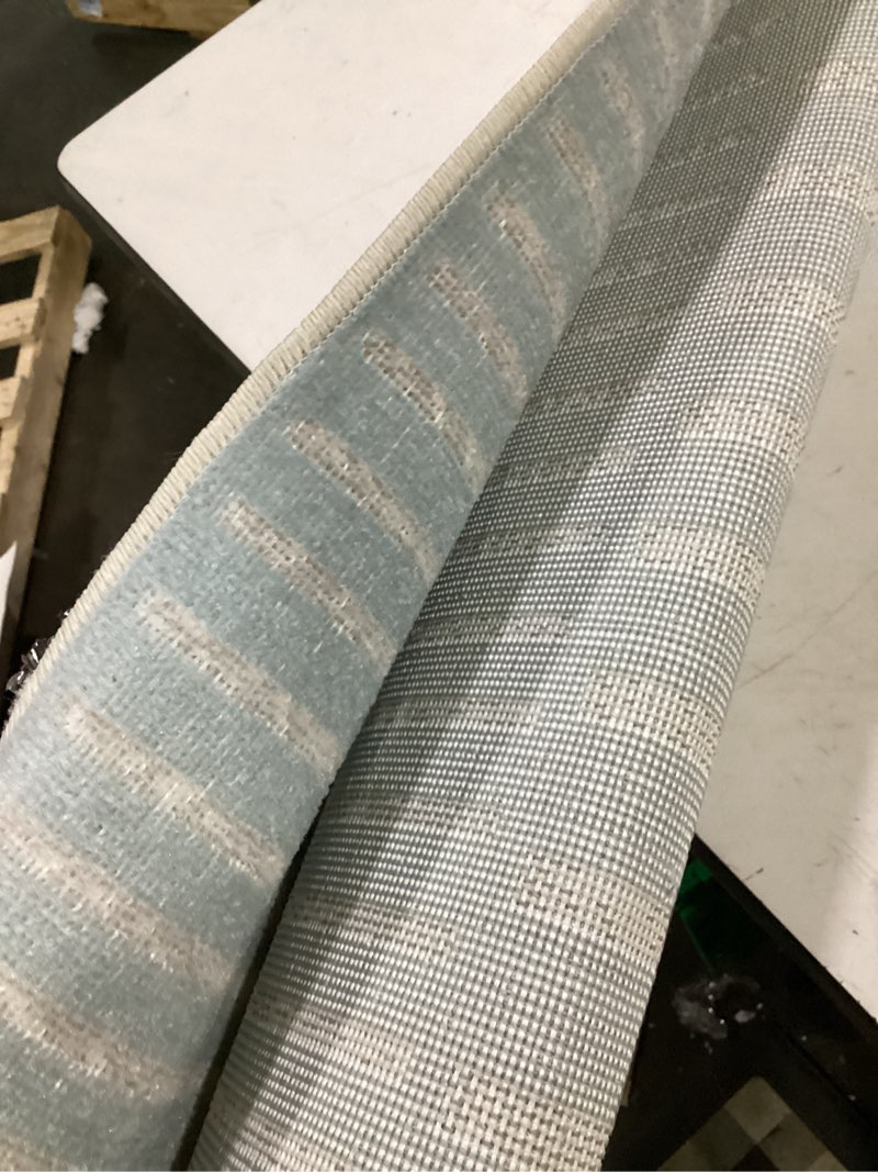Condition photo showing Good Condition for tommy bahama poolside offset stripe indoor outdoor area rug, stripe modern design, uv fade resistant,blue/ivory,5'2"x7'2" blue/ivory 5'2" x 7'2" (rectangular)