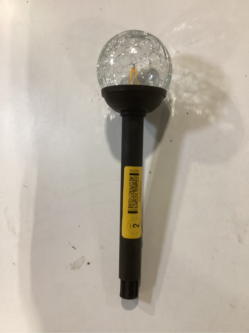 Condition photo showing As Is for harbor breeze 3 -lumens matte black solar led outdoor path light with dusk-to-dawn sensor