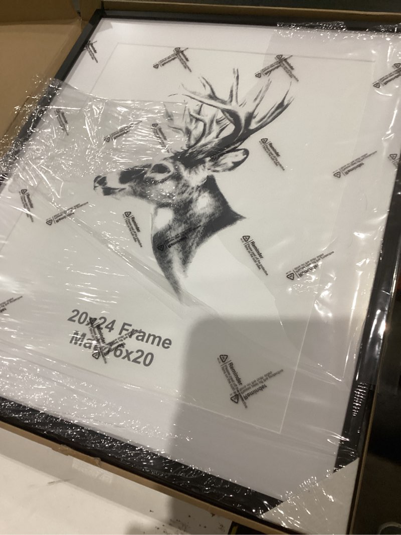 Condition photo showing As Is for yaetm 20x24 black wood picture frame with mat for 16x20 set of 2, solid wood frame for photos, posters & art prints, horizontal and vertical wall mount (2 pack, anthracite black) 20"x24", 2 pack anthracite black