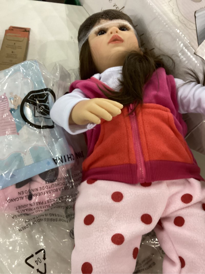 Condition photo showing Good Condition for iCradle Realistic Look 24inch 60cm Reborn Baby Doll Soft Silicone Vinyl Toddler Doll Reborn Lifelike Princess Long Hair Baby Doll Toy for Ages 3+ Pink Outfit