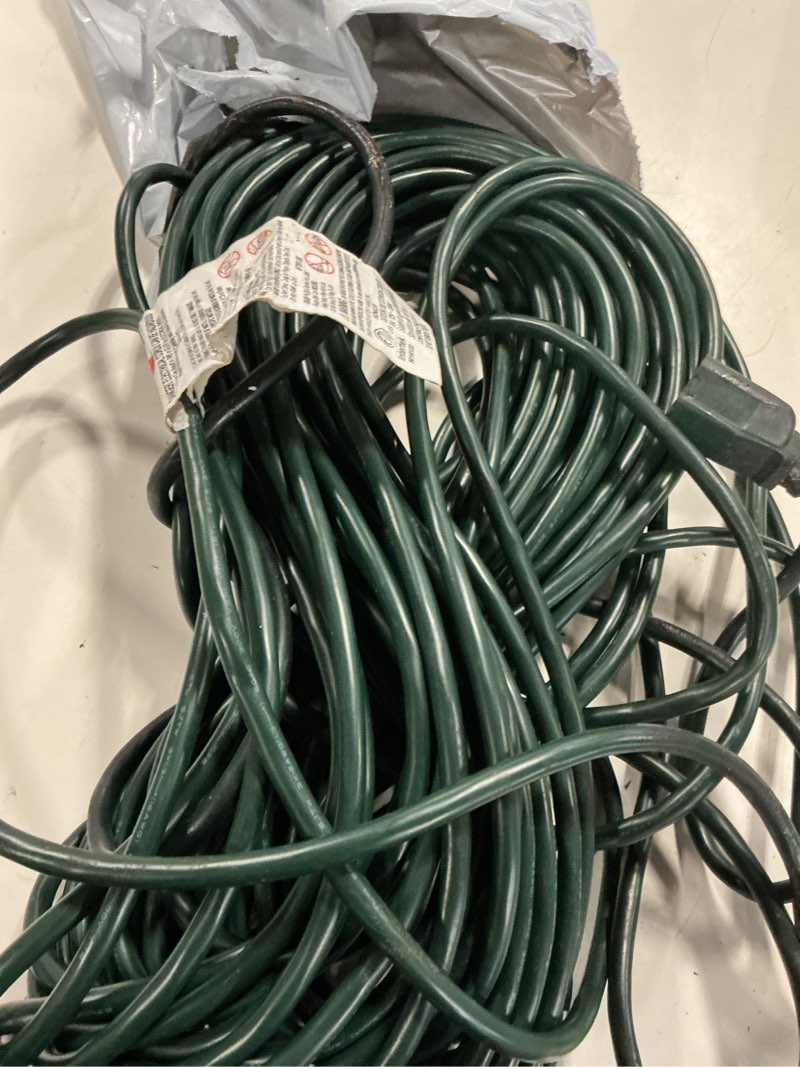 Condition photo showing As Is for utilitech 75-ft   light duty 3 prong green outdoor extension power cord 10a , 125 v~1250w