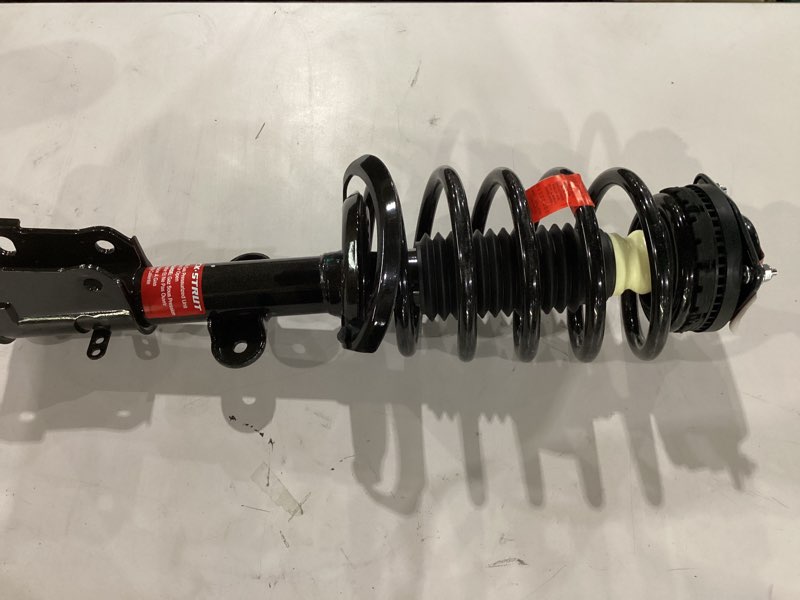 Condition photo showing Good Condition for monroe quick-strut 471128r suspension strut and coil spring assembly for chrysler town & country