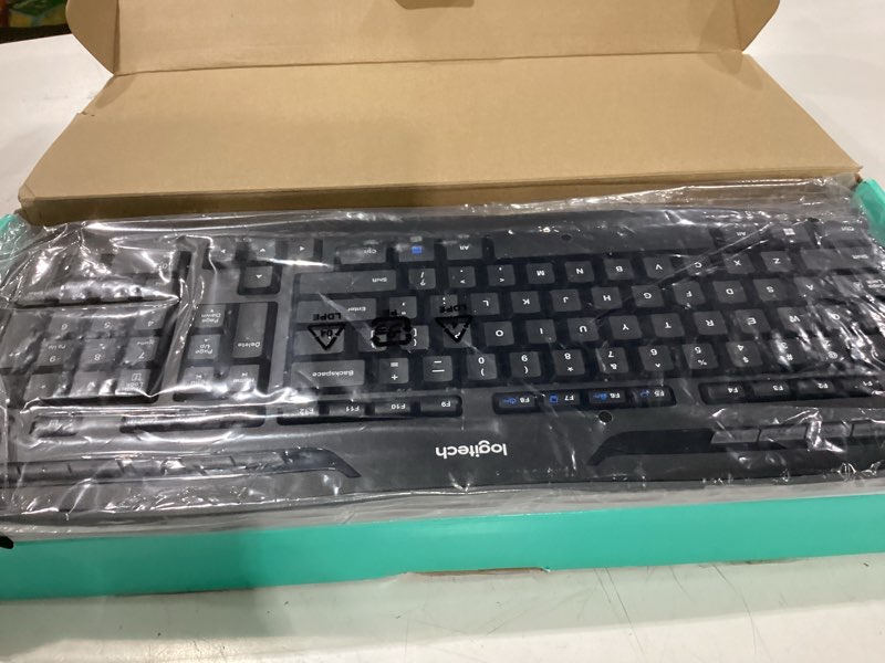 Condition photo showing As Is for not tested logitech mk335 quiet wireless keyboard and mouse combo - black/silver keyboard and mouse combo wireless, ambidextrous