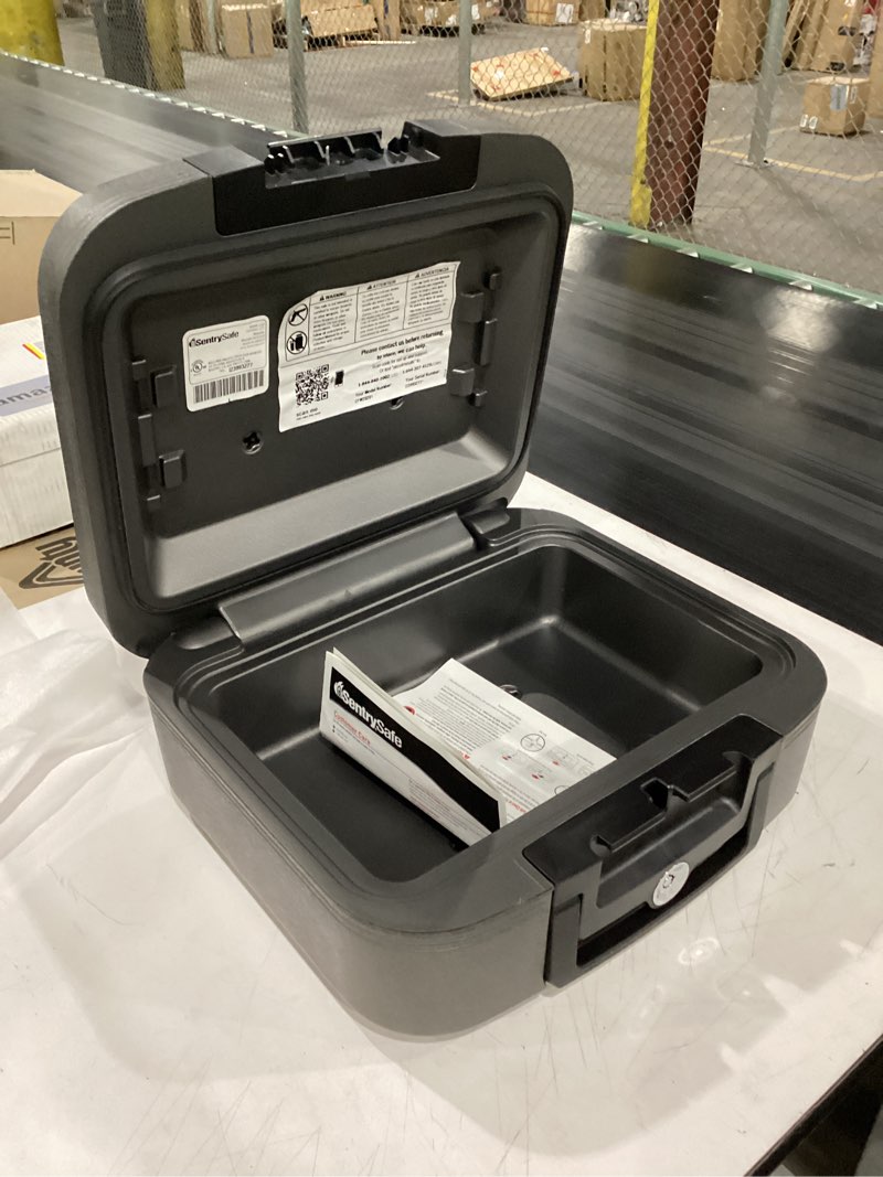 Condition photo showing As Is for sentrysafe dark gray fireproof and waterproof safe with key lock, chest lock box with carrying handle for travel, 0.28 cubic feet, 6.6 x 15.4 x 14.3 inches, cfw20201 1 hr. fireproff, no lid straps