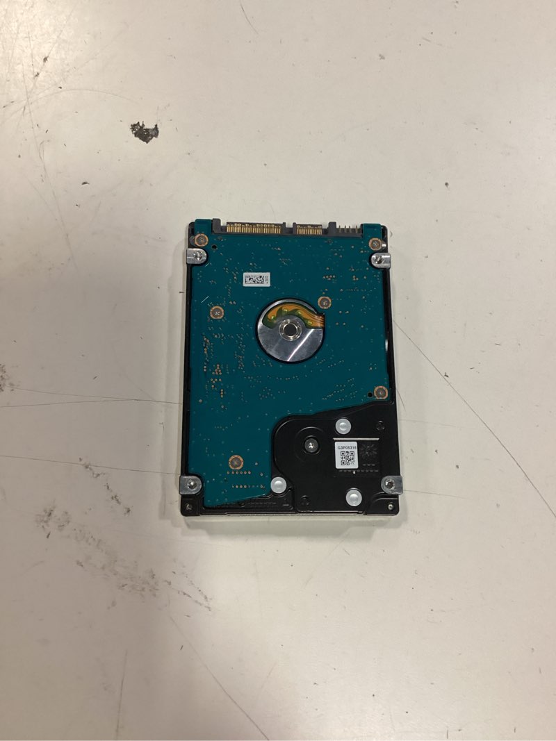 Condition photo showing As Is for toshiba 1tb 5400rpm 8mb cache sata 3.0gb/s 2.5 inch ps3/ps4 hard drive - 3 year warranty