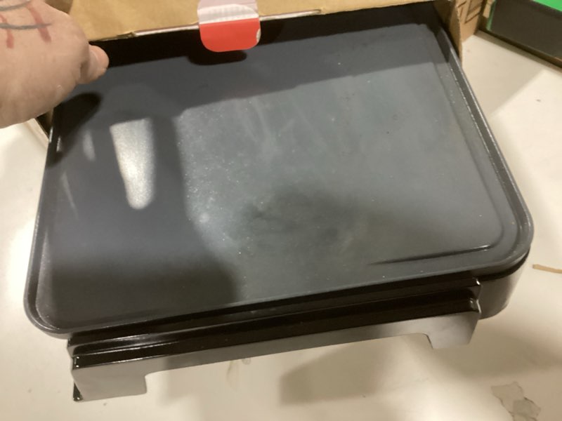 Condition photo showing As Is for Gourmia 22 Inch XL Electric Griddle Pan - Nonstick Extra Large Flat Top Ceramic Surface, Countertop Cooker, Adjustable 200°F–400°F, Pull-Out Drip Tray, Compact Handle-Free Design