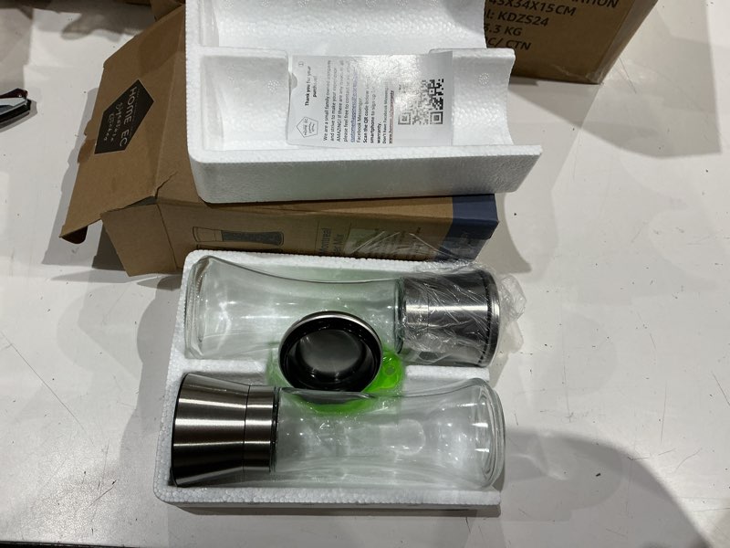Condition photo showing Good Condition for home ec premium stainless steel sea salt and pepper grinder set of 2 - adjustable ceramic - tall glass salt and pepper shakers - kitchen spice mill w/funnel & ebook clear glass 2pk