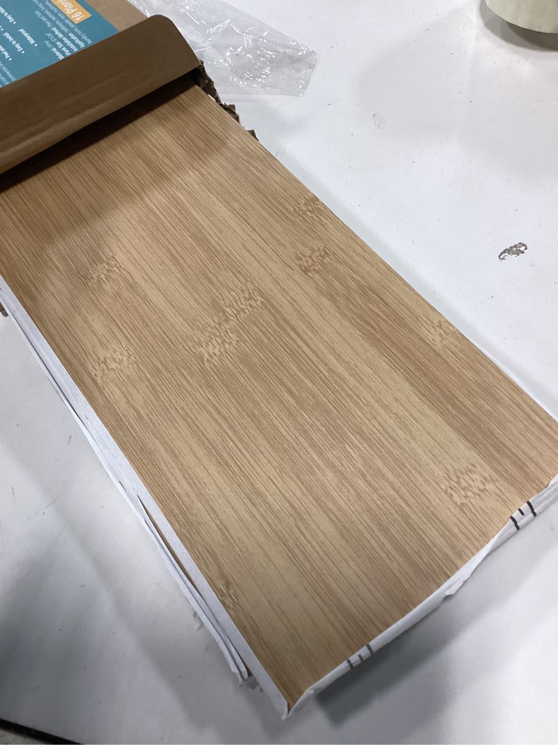 Condition photo showing Good Condition for VEELIKE Natural Bamboo Peel and Stick Flooring Waterproof Vinyl Plank Flooring 16-Pack 24 Sq. ft. Peel and Stick Floor Tile Wood Laminate Flooring Stick on Floor Tiles for Bedroom Kitchen RV 6''x36'' Box of 16 Planks