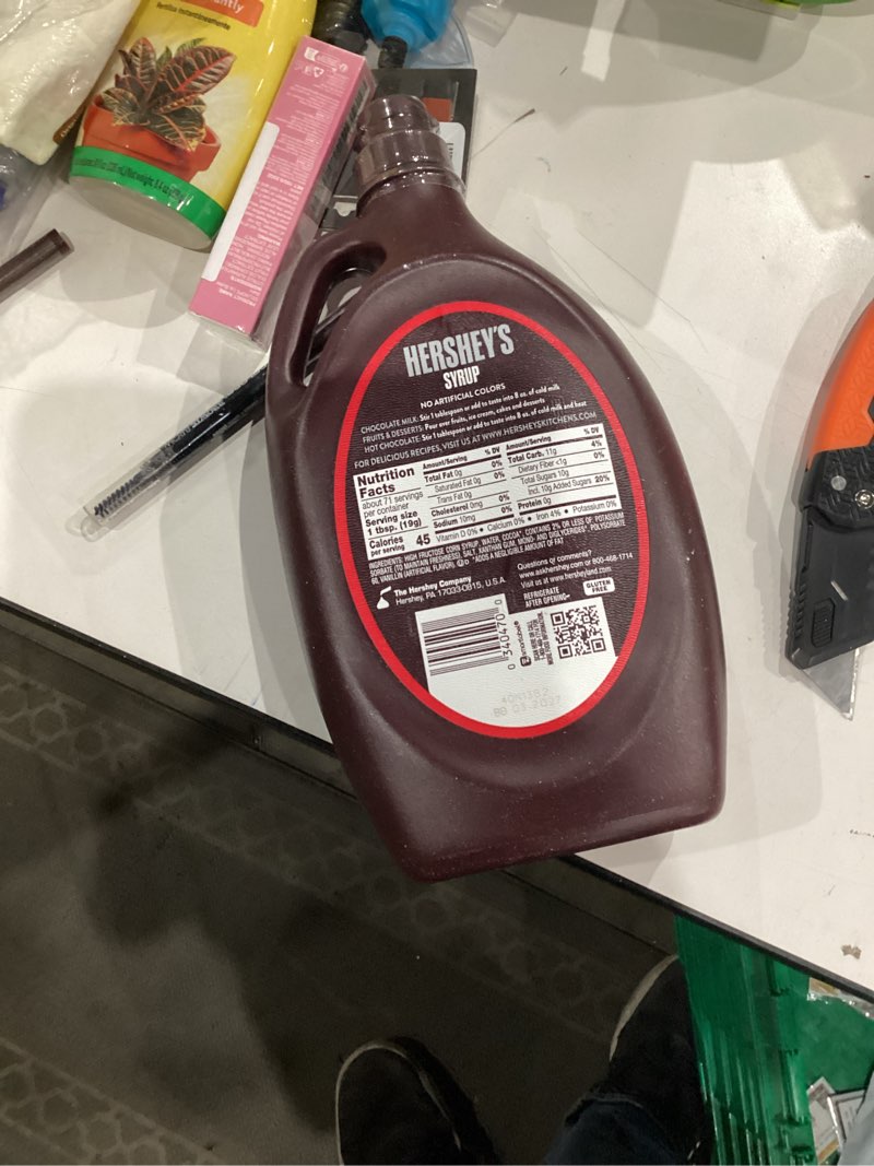 Condition photo showing New/Like New for HERSHEY'S Chocolate Syrup Bulk Bottle, 48 oz Chocolate 48 Ounce (Pack of 1)