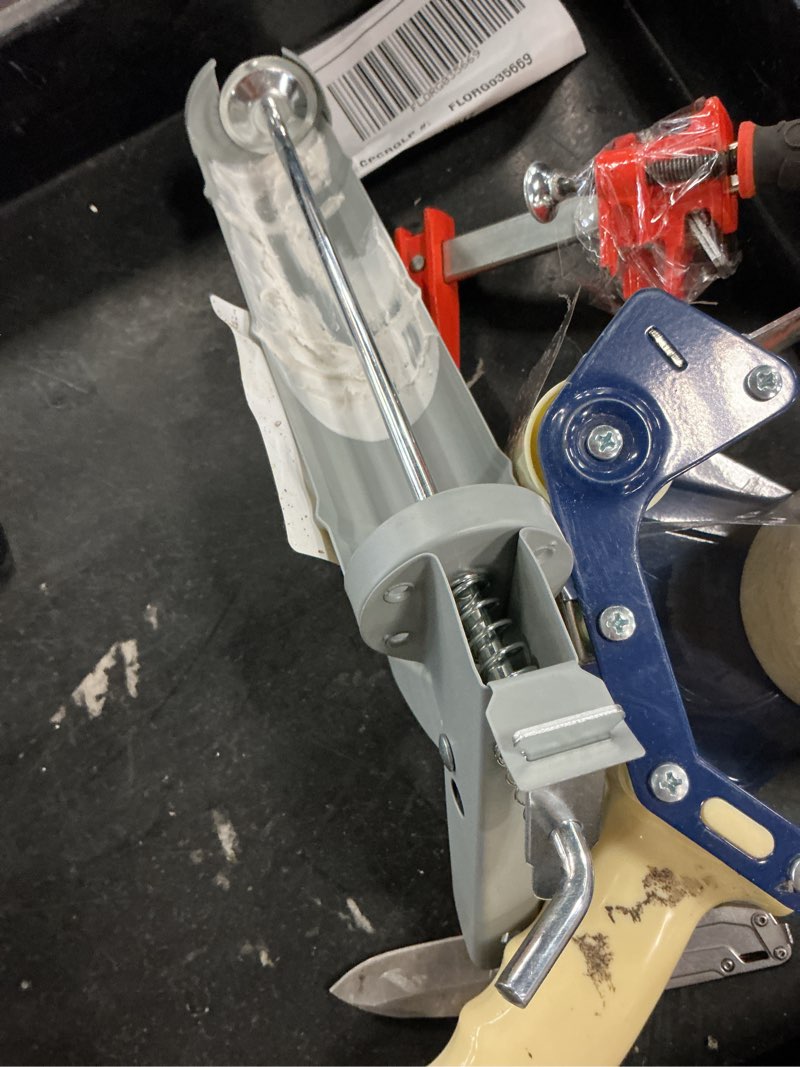 Condition photo showing As Is for project source 10-oz cordless rod caulk gun