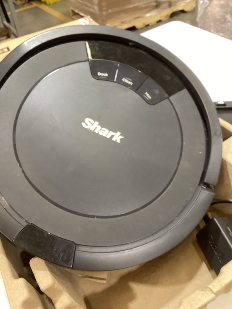 Condition photo showing As Is for shark av753 ion robot vacuum, tri-brush system, wifi connected, 120 min runtime, works with alexa, multi surface cleaning, grey