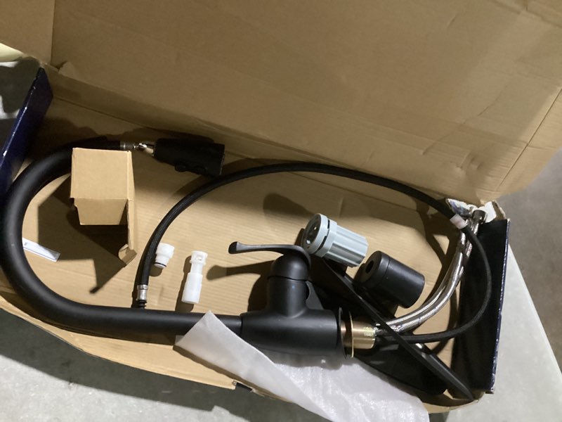 Condition photo showing As Is for project source tucker matte black single handle deck-mount pull-down kitchen faucet with sprayer (includes deck plate)