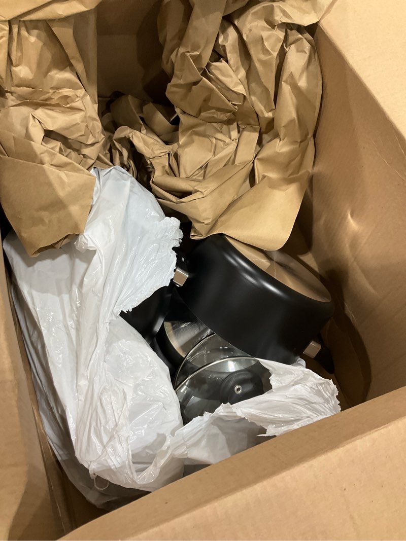 Condition photo showing As Is for Amazon Basics Non Stick Kitchen Cookware 8-Piece Set, Non-Induction, Includes Pots and Pans, Black