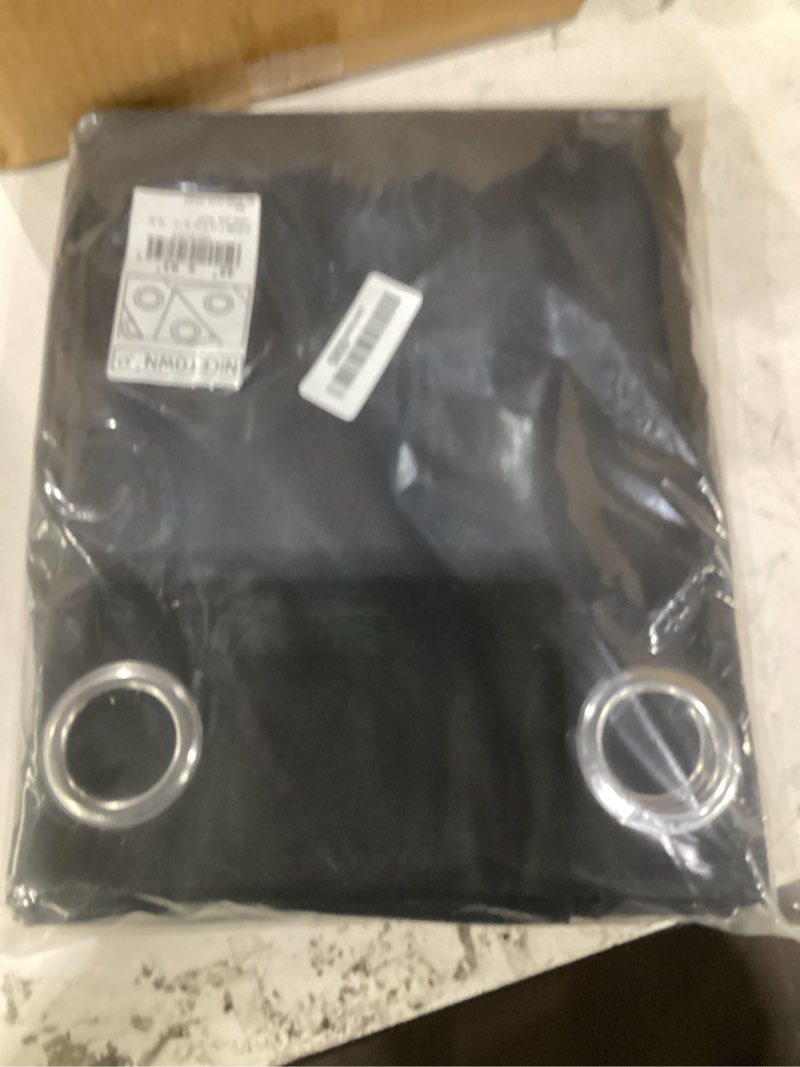 Condition photo showing New/Like New for nicetown pitch black solid thermal insulated grommet blackout curtains/drapes for bedroom window (2 panels, 42 inches wide by 63 inches long, black) black 42"w x 63"l (pack of 2)