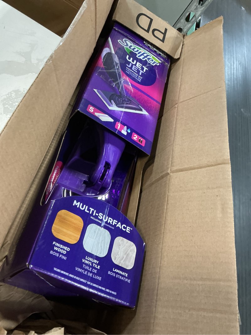 Condition photo showing As Is for swiffer wet jet mop, floor cleaner for mopping wood, laminate, tile in home, bathroom, kitchen, all purpose multi-surface cleaning set includes 1 spray mop, 5 pads refill, 1 fresh scent solution dust mop