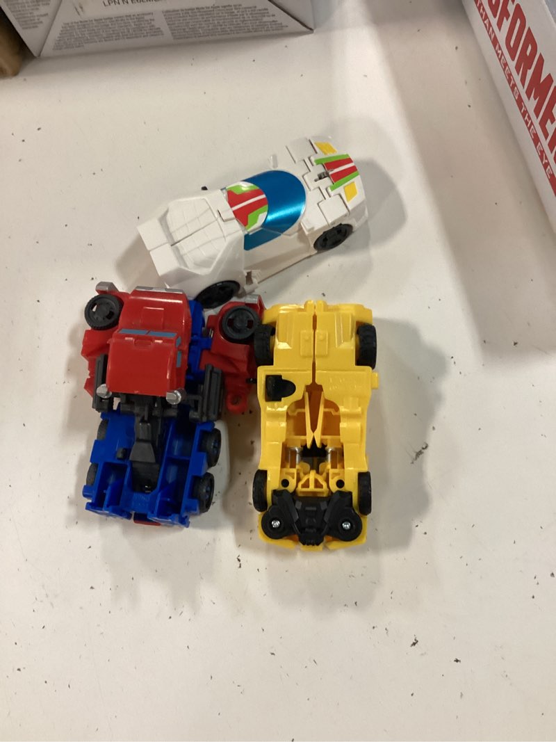 Condition photo showing Good Condition for transformers 1-step flip heroes 3-pack, 4-inch wheeljack, bumblebee, and optimus prime action figures, kids easter toys or basket stuffers, age 6+
