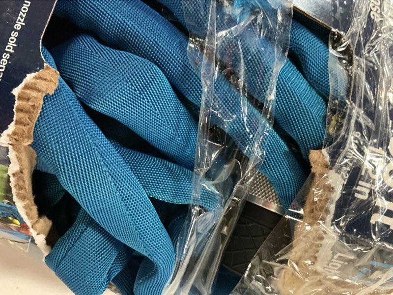 Condition photo showing As Is for project source project source lightweight 1/2-in x 30-ft premium -duty kink free woven blue coiled hose