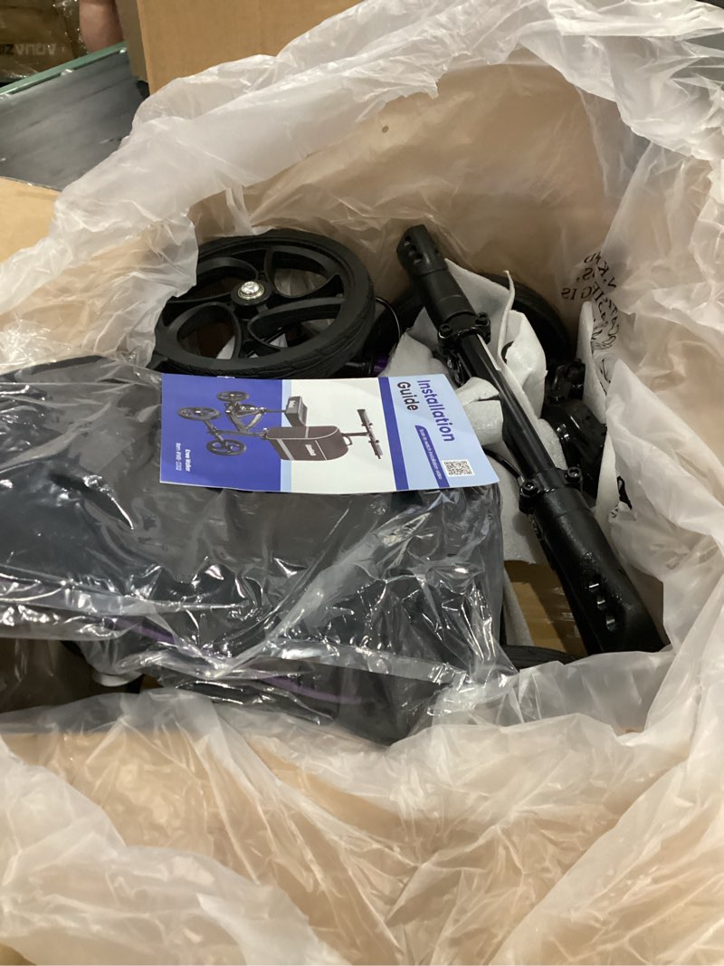 Condition photo showing Good Condition for steerable knee walker deluxe medical scooter for foot injuries compact crutches, with dual rear on-wheel brake and shock absorption under the knee pad?purple?