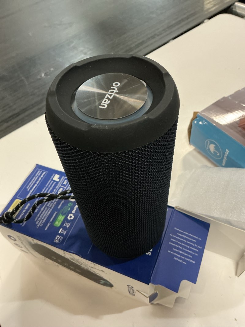 Condition photo showing Good Condition for ortizan portable bluetooth speaker (1nd gen), ipx7 waterproof, wireless, big sound and deep bass, tws pairing, 30hrs of playtime, for home/party/outdoor/beach, birthday gifts for men women - black