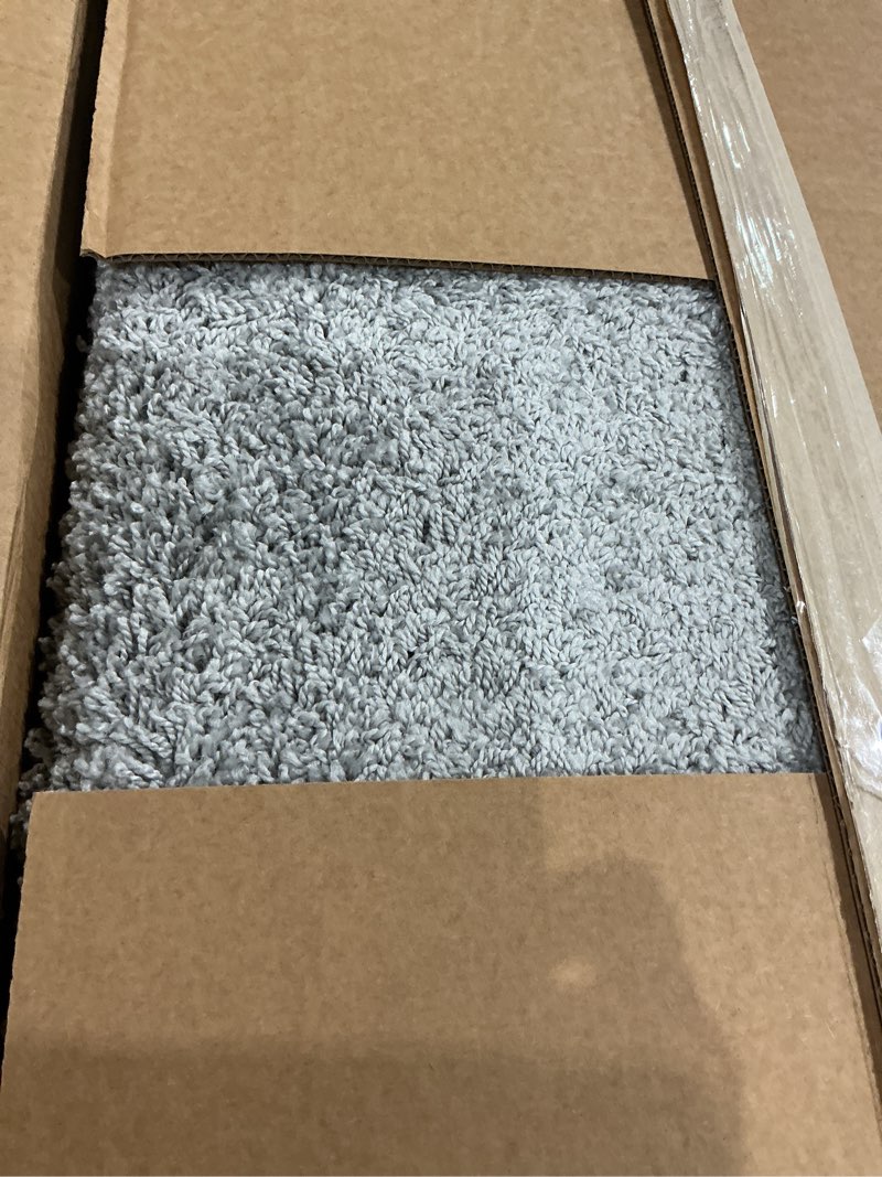 Condition photo showing Good Condition for garland rug skyline shag solid 5 ft. x 7 ft. silver gray area rug– soft and fluffy shag texture, plush high pile, durable, non-slip, add warmth, comfort and style silver 5' x 8' (rectangular)