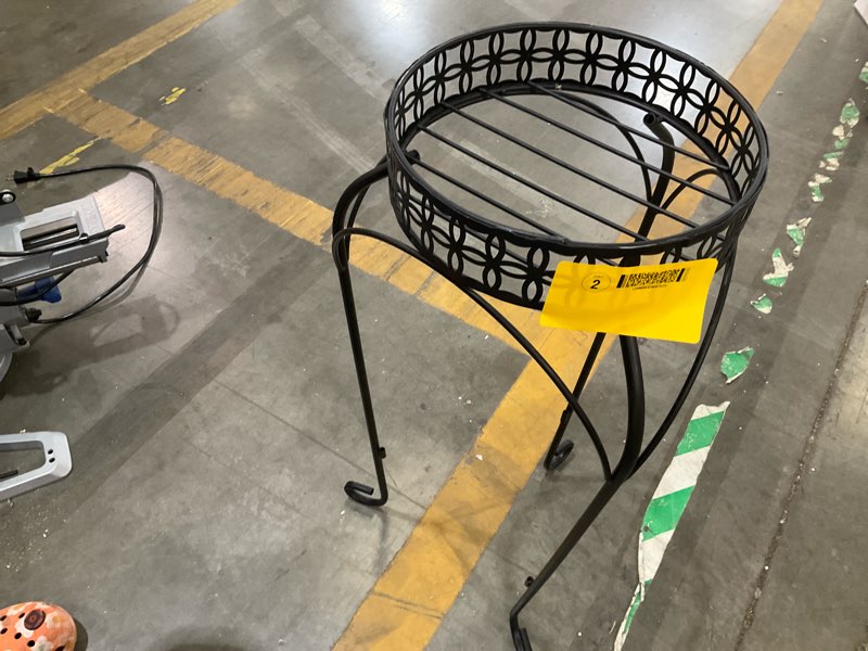 Condition photo showing As Is for wire planter holder