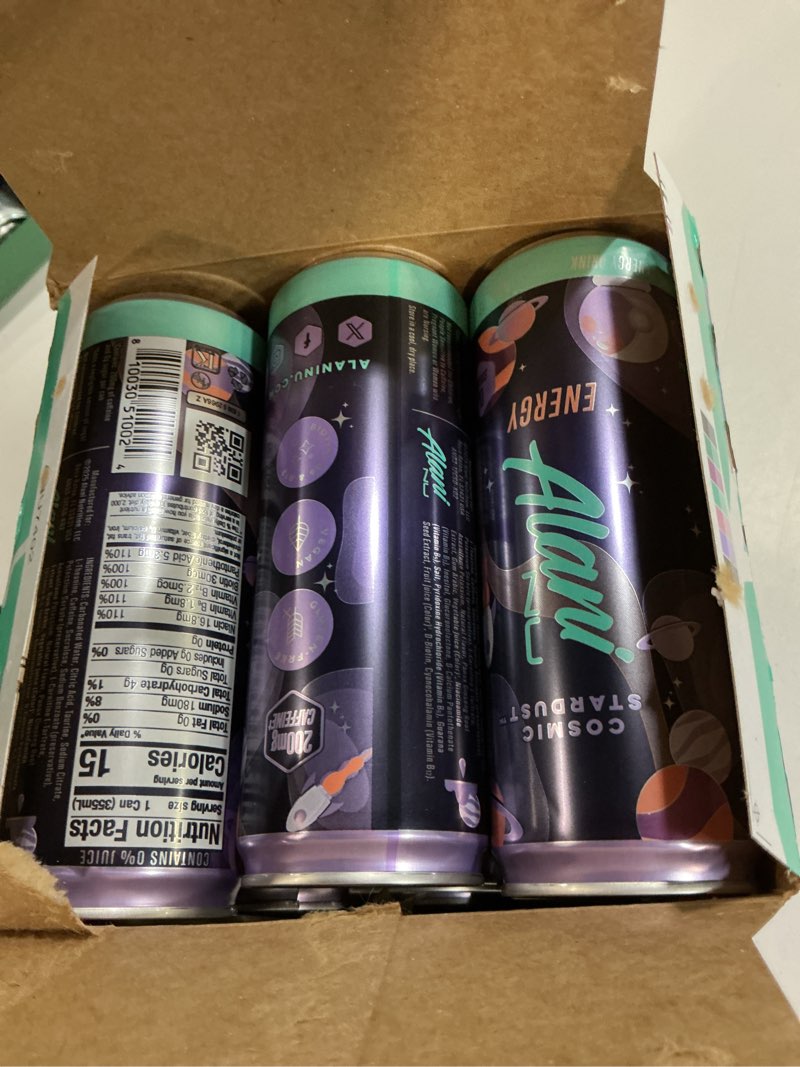 Condition photo showing New/Like New for ( BB/11/2027) Alani Nu COSMIC STARDUST, Sugar Free, Low Calorie Energy Drinks, 200mg Caffeine, Biotin, B Vitamins, Zero Sugar, 10 Calories, 12 Fl Oz Cans, 24 Pack Cosmic Stardust 12 Fl Oz (Pack of 24)