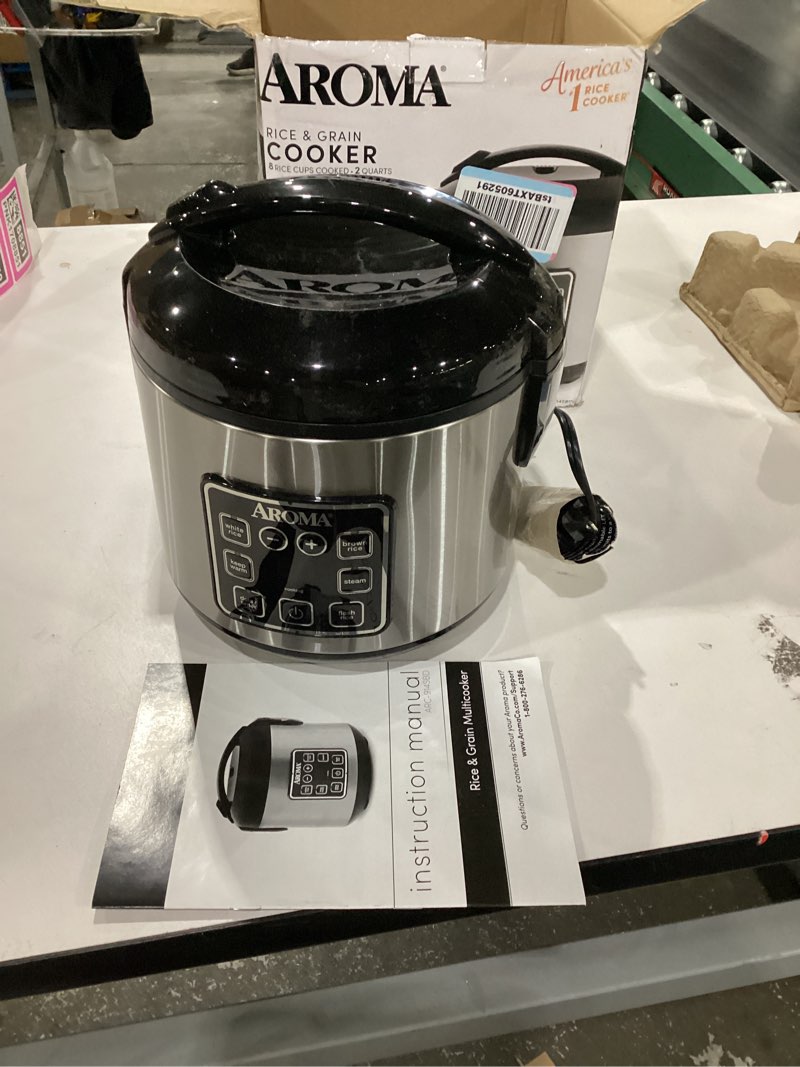 Condition photo showing Good Condition for AROMA Digital Rice Cooker, 4-Cup (Uncooked) / 8-Cup (Cooked), Steamer, Grain Cooker, Multicooker, 2 Qt, Stainless Steel Exterior, ARC-914SBD 4 Cup Uncooked / 8 Cup Cooked