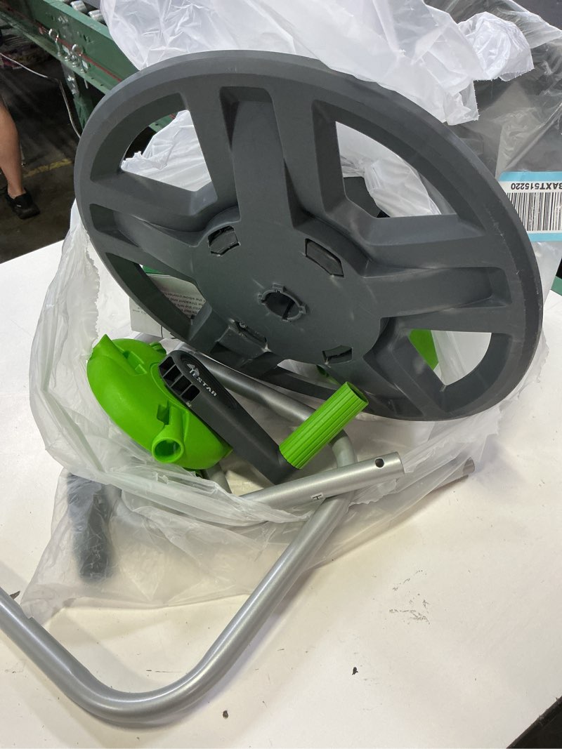 Condition photo showing As Is for water hose reel cart, holds 60-80 ft of 5/8 inch hose, green wall mounted garden hose cart, portable hose reel for convenient storage and watering