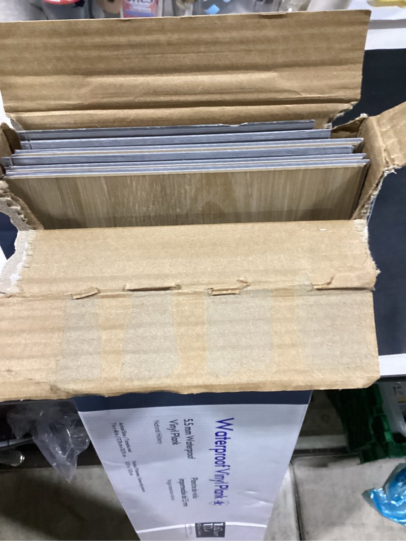 Condition photo showing Good Condition for possibly incomple.. style selections natural hickory yellow 20-mil x 7-in w x 48-in l waterproof interlocking luxury vinyl plank flooring (18.62-sq ft/ carton)e