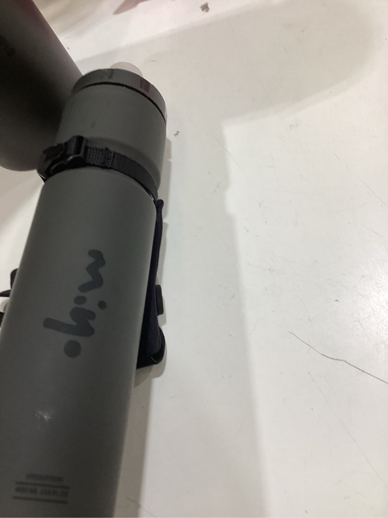 Condition photo showing As Is for miyo insulated handheld running water bottle 14oz lightweight squeeze bottle with adjustable hand st
