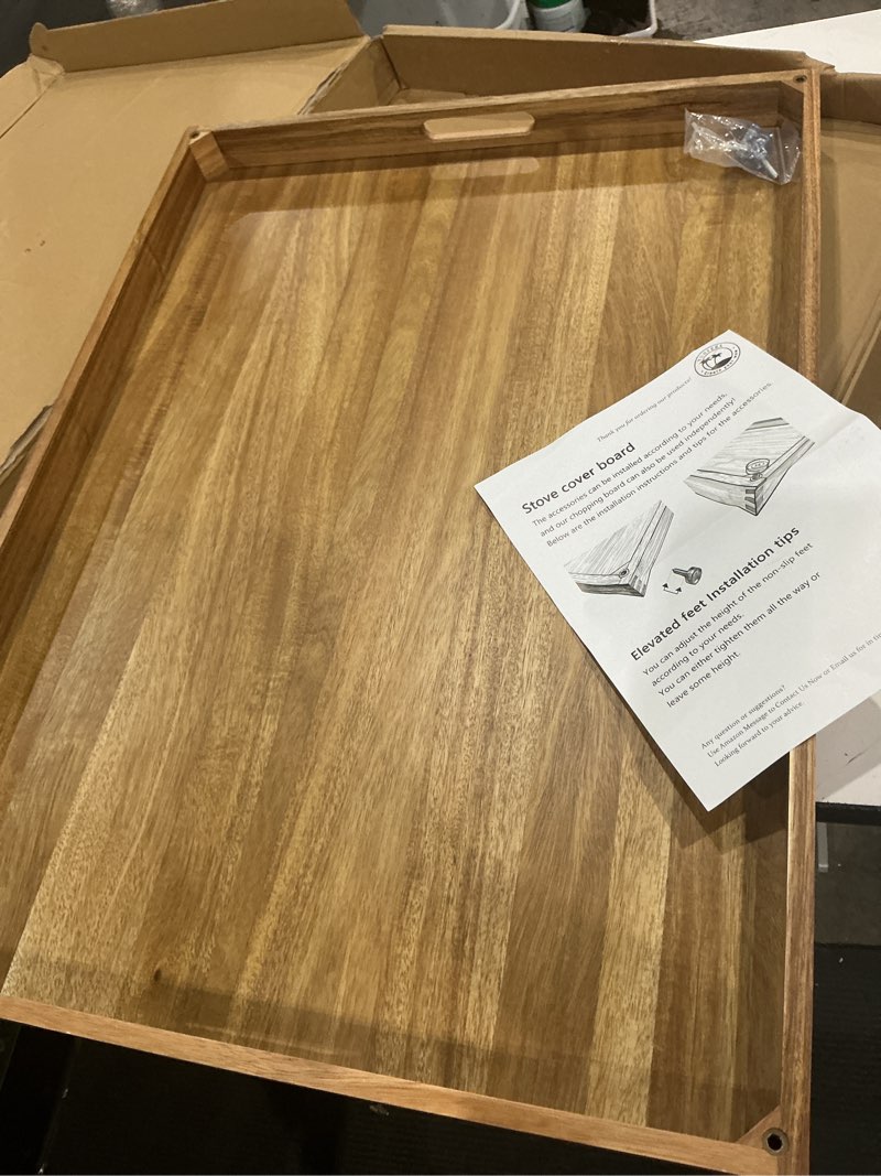 Condition photo showing As Is for yuhfera,stove cover board