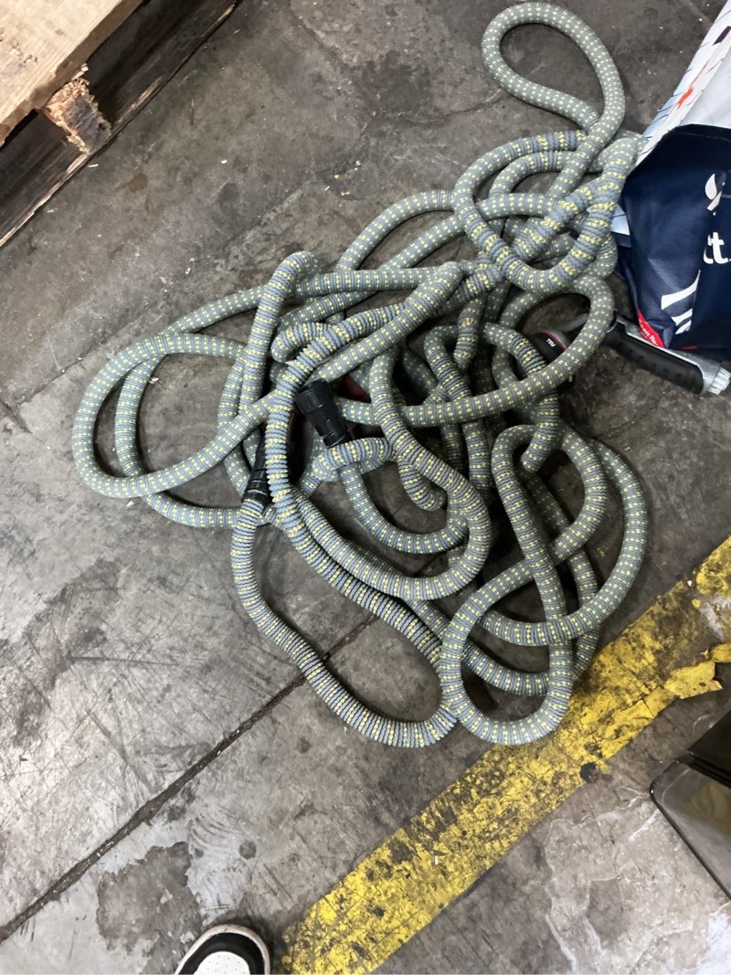 Condition photo showing As Is for hydrotech 5/8 in. x 25 ft. expandable burst proof hose, blue