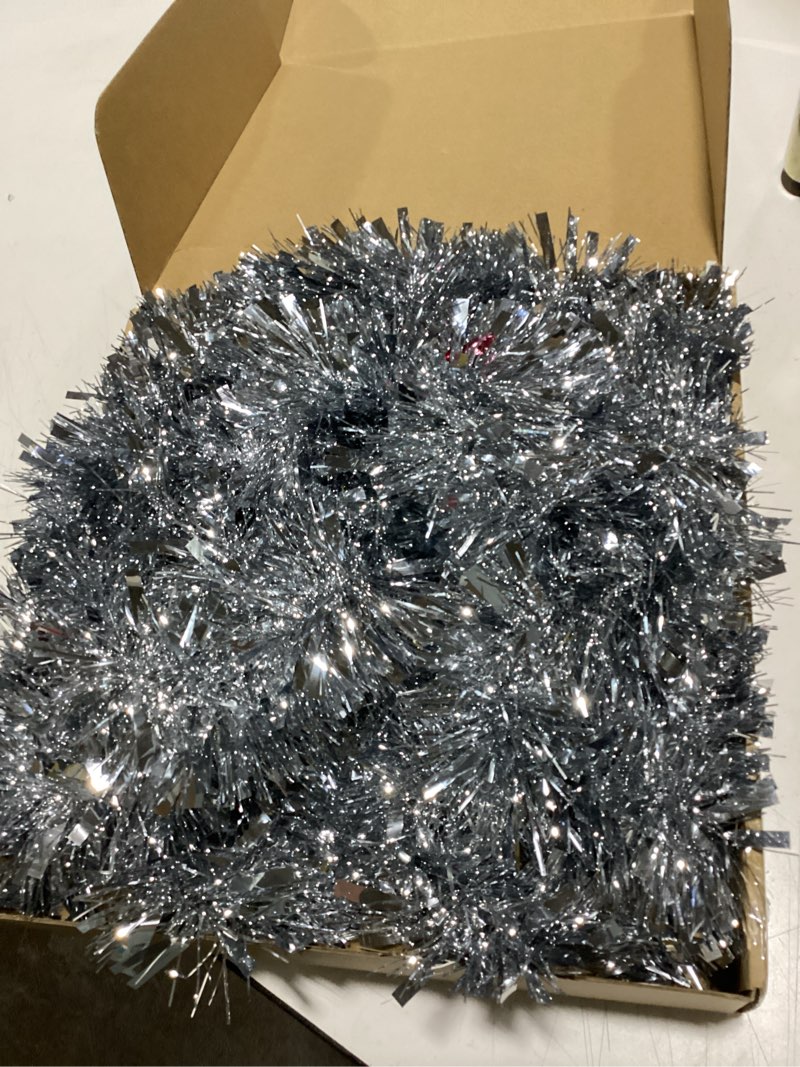 Condition photo showing Good Condition for Gejoy 2 Pcs 12 Inch Large Christmas Star Tree Topper with 33 ft Christmas Tinsel Garland Big LED Lighted Glittered Star Metallic Garlands for Xmas Tree Decorations Holiday Party Supplies(Silver)