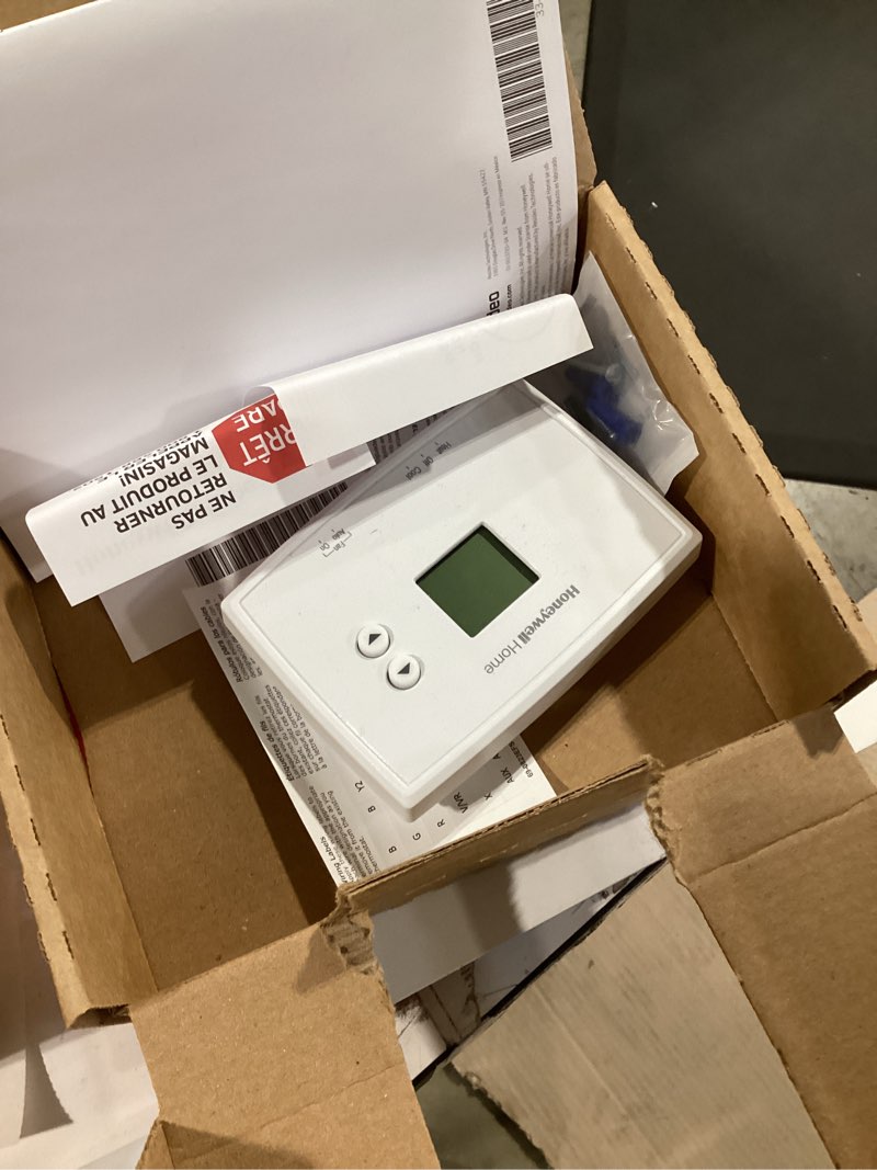 Condition photo showing As Is for Honeywell RTH111B1016/A Non-Programmable Thermostat