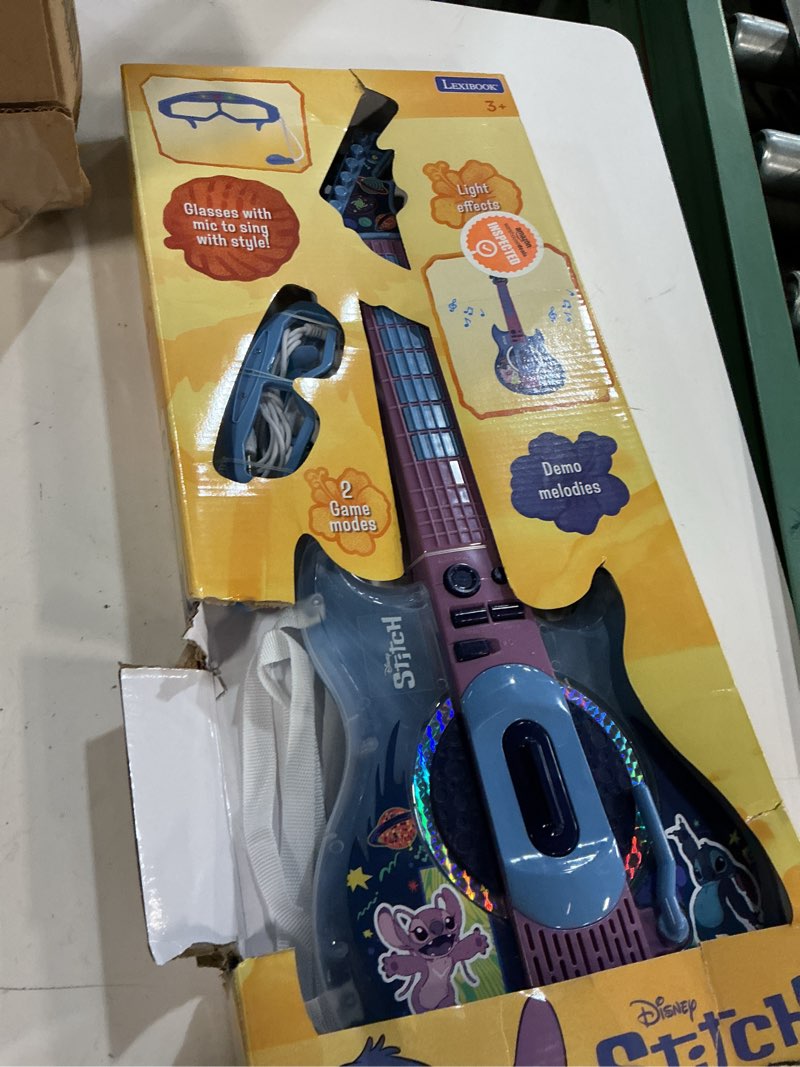 Condition photo showing Good Condition for lexibook, disney stitch, electronic guitar with microphone and glasses for stylish singing, 2 game modes, demo melodies, light effects, blue, k260d