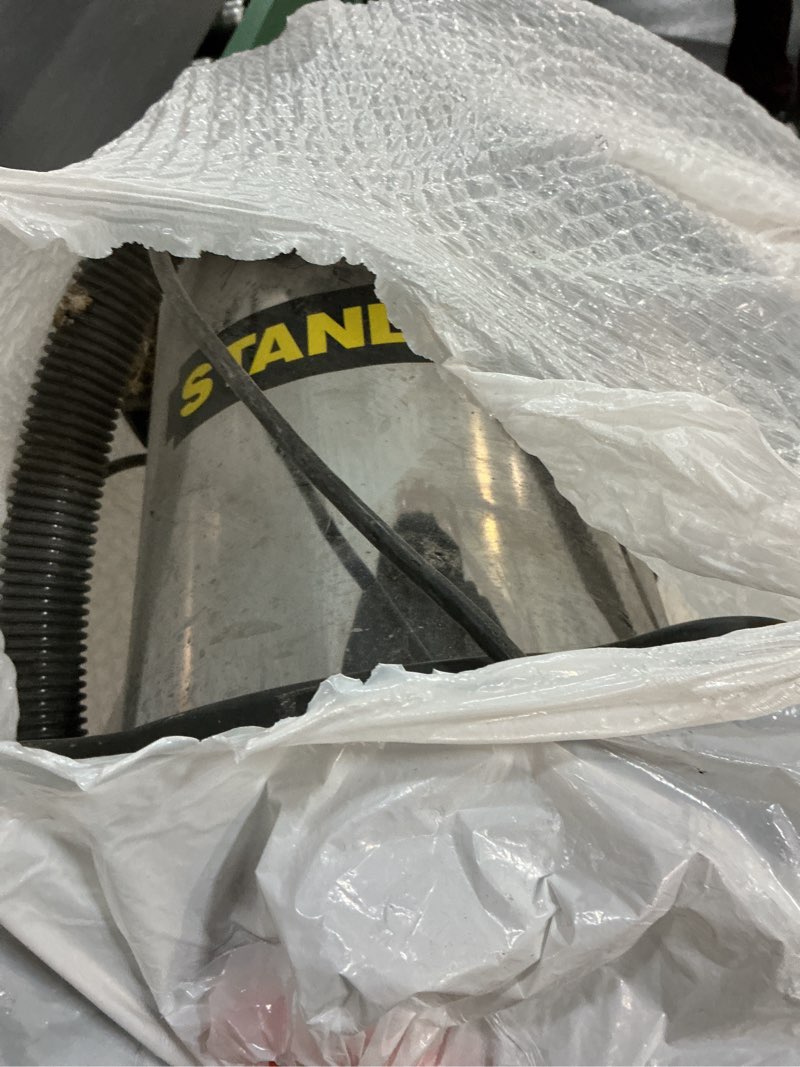 Condition photo showing As Is for stanley - sl18129 wet/dry vacuum, 4 gallon, 4 horsepower, stainless steel tank silver+yellow