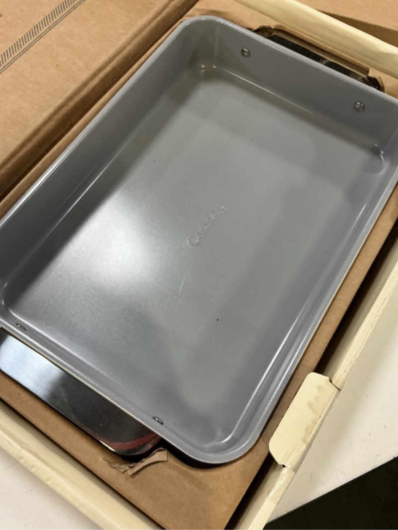 Condition photo showing Good Condition for caraway non-stick ceramic 9” square pan - naturally slick ceramic coating - non-toxic, ptfe & pfoa free - perfect for brownies, lemon bars, cakes, & more - cream cream square pan (9" x 9")