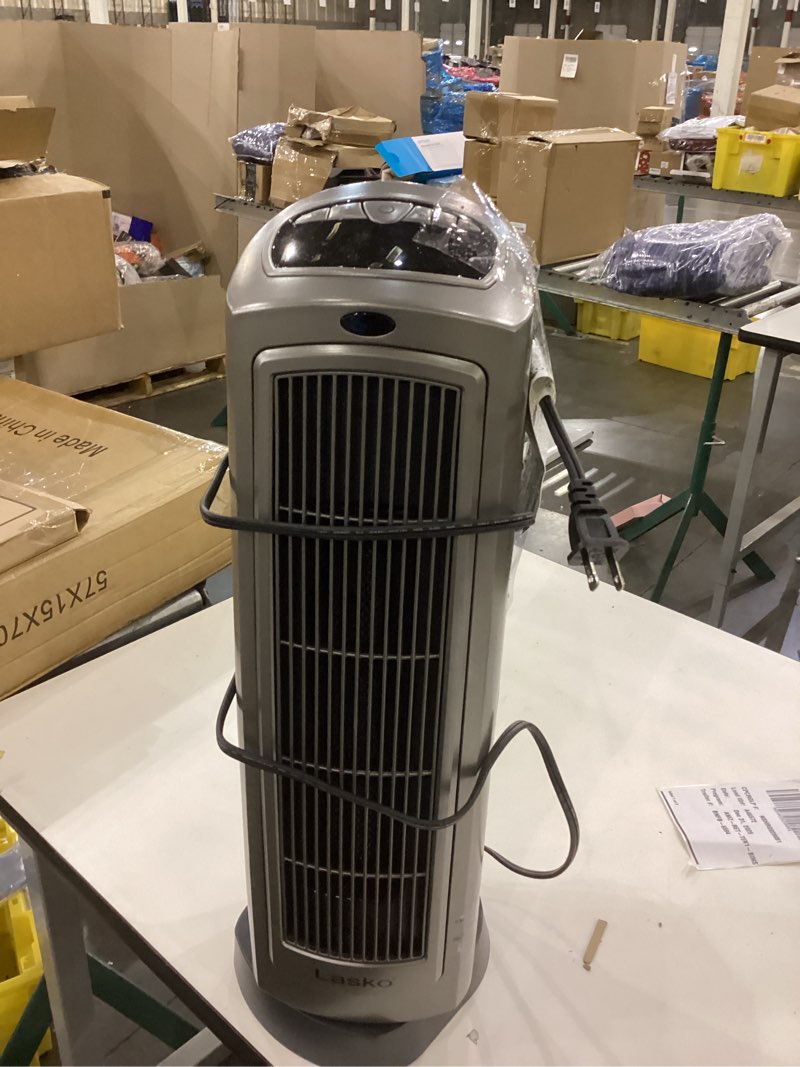Condition photo showing As Is for Lasko Oscillating Digital Ceramic Tower Heater for Home with Adjustable Thermostat, Timer and Remote Control, 23 Inches, 1500W, Silver, 755320 Silver Heater