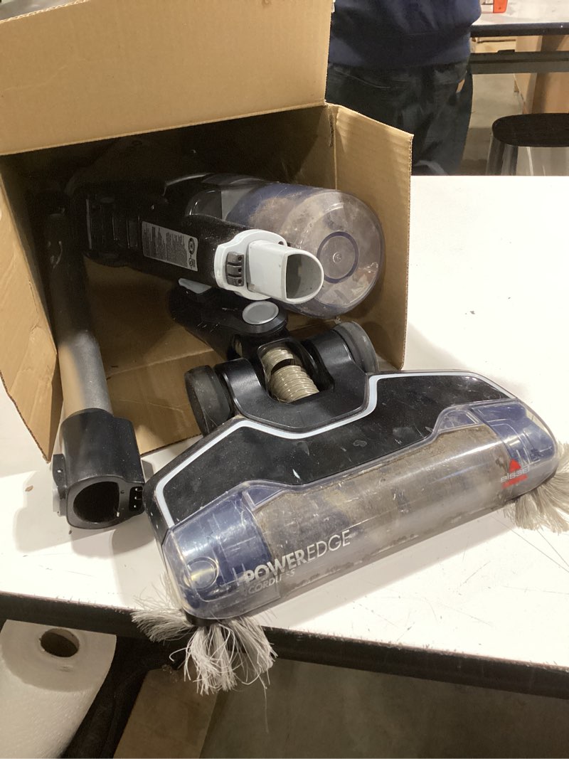 Condition photo showing As Is for bissell powerclean furguard 280w self-standing cordless vacuum w/self-cleaning brush roll, strong suction, removeable battery, wall mount, upholstery tool & bright headlights