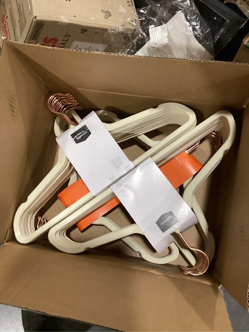 Condition photo showing New/Like New for amazon basics slim velvet non-slip space saving suit clothes hangers, closet organizer, sturdy construction, ivory/rose gold, 50-pack ivory/rose gold pack of 50