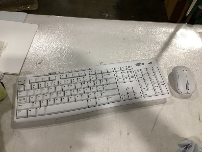 Condition photo showing As Is for **incomplete** (no usb for syncing) Logitech MK295 Wireless Mouse & Keyboard Combo with SilentTouch Technology, Full Numpad, Advanced Optical Tracking, Lag-Free Wireless, 90% Less Noise - Off White Off-White