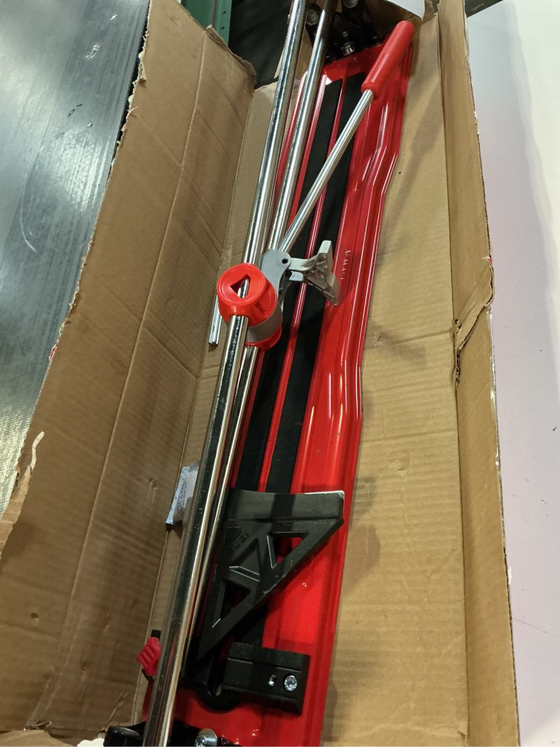 Condition photo showing As Is for rubi practic 61 plus-24 in. tile cutter with tungsten carbide blade and roller guide