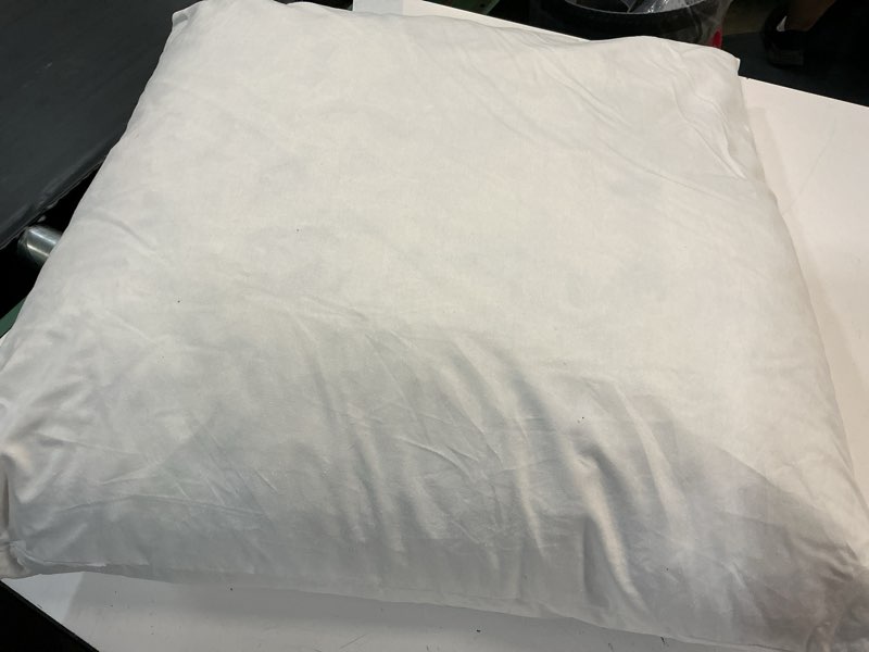 Condition photo showing As Is for quince premium down alternative pillow medium off 1