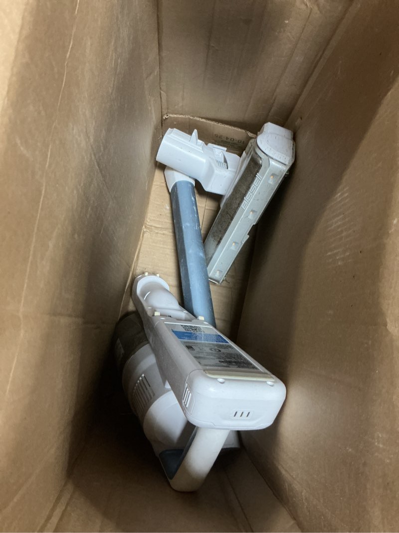 Condition photo showing As Is for Bissell PowerClean 200W Self-Standing Cordless Vacuum w/Tangle Free Brush Roll, Removeable Battery, Wall Mount, Upholstery Tool & Bright Headlights, 4173