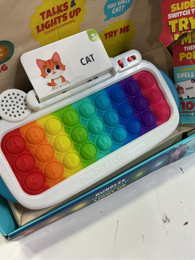 Condition photo showing Good Condition for chuckle & roar pop it! abc & spelling keyboard – interactive alphabet & sight word learning toy with led lights, soft sensory keys, 3 grow-with-me modes, screen-free educational toy for kids