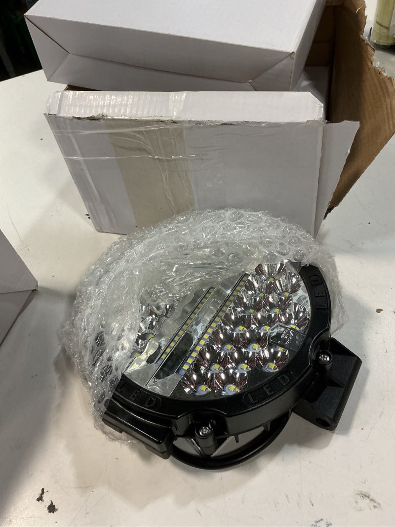 Condition photo showing New/Like New for round led off-road lights - 7inch led tractor work light 201w auxiliary driving light pod fog lamp with wiring harness for pickup trucks snowmobile boat suv atv utv(4 pack black+2 wiring) 4pc 201w black+2pc wiring