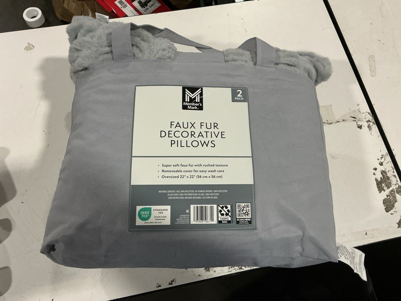 Condition photo showing New/Like New for member's mark 2-pack ruched faux fur decorative pillows, 22" x 22"