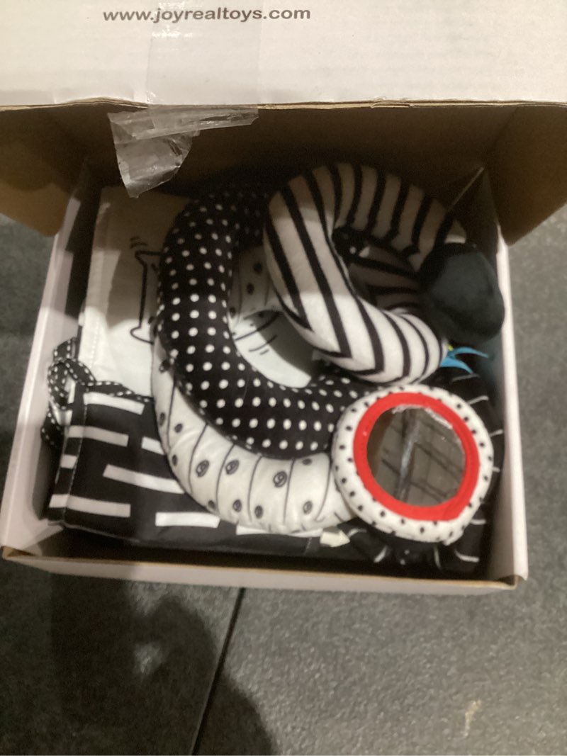 Condition photo showing As Is for joyreal high contrast baby toys for newborn, black and white baby sensory toys with car seat toys,infant toys with black white cards book, montessori toys for baby gifts black and white high contrast baby toys with car seat toys